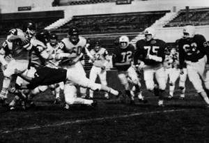Photo courtesy of SAMRU Alumni. A shot from a 1960s Cougar football game at Mewata Stadium. The team won the league championship in 1961.