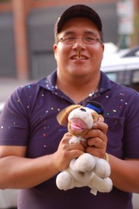 This guy caught the stuffed dog filled with glitter. Manly.