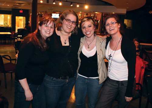 Photo by Bryce Visser. From left: Jennifer Langille, Megan Melnyk, Kaylene McTavish, and Michelle Dennis pose in the Liberty Lounge.