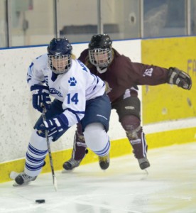 Chelsey Morrill battles with a MacEwan defender during the Cougars’ 3-0 series sweep of the Griffins.