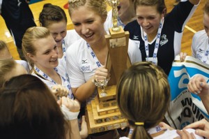 Photo by Jorden Dixon. The Cougars women’s volleyball team is all smiles after capturing the ACAC crown